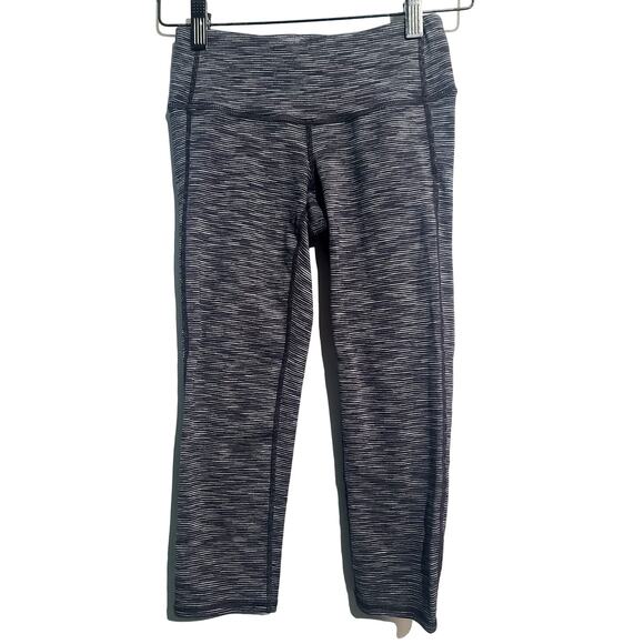 Athleta Pants - ATHLETA Energy Chaturanga Capri Leggings